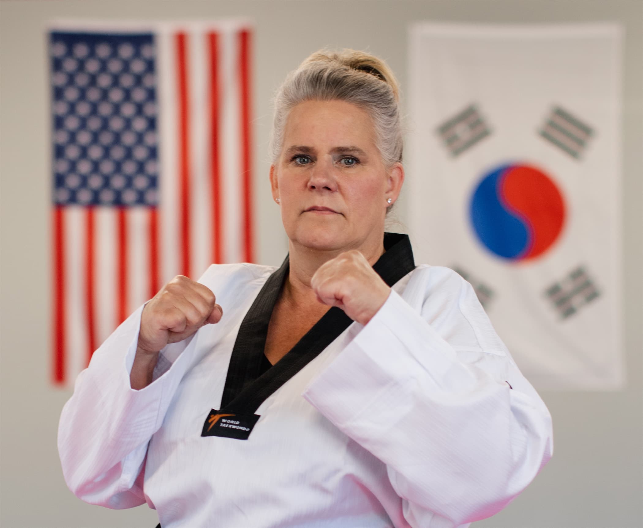 Instructor Debbie Raiz in a fighting stance