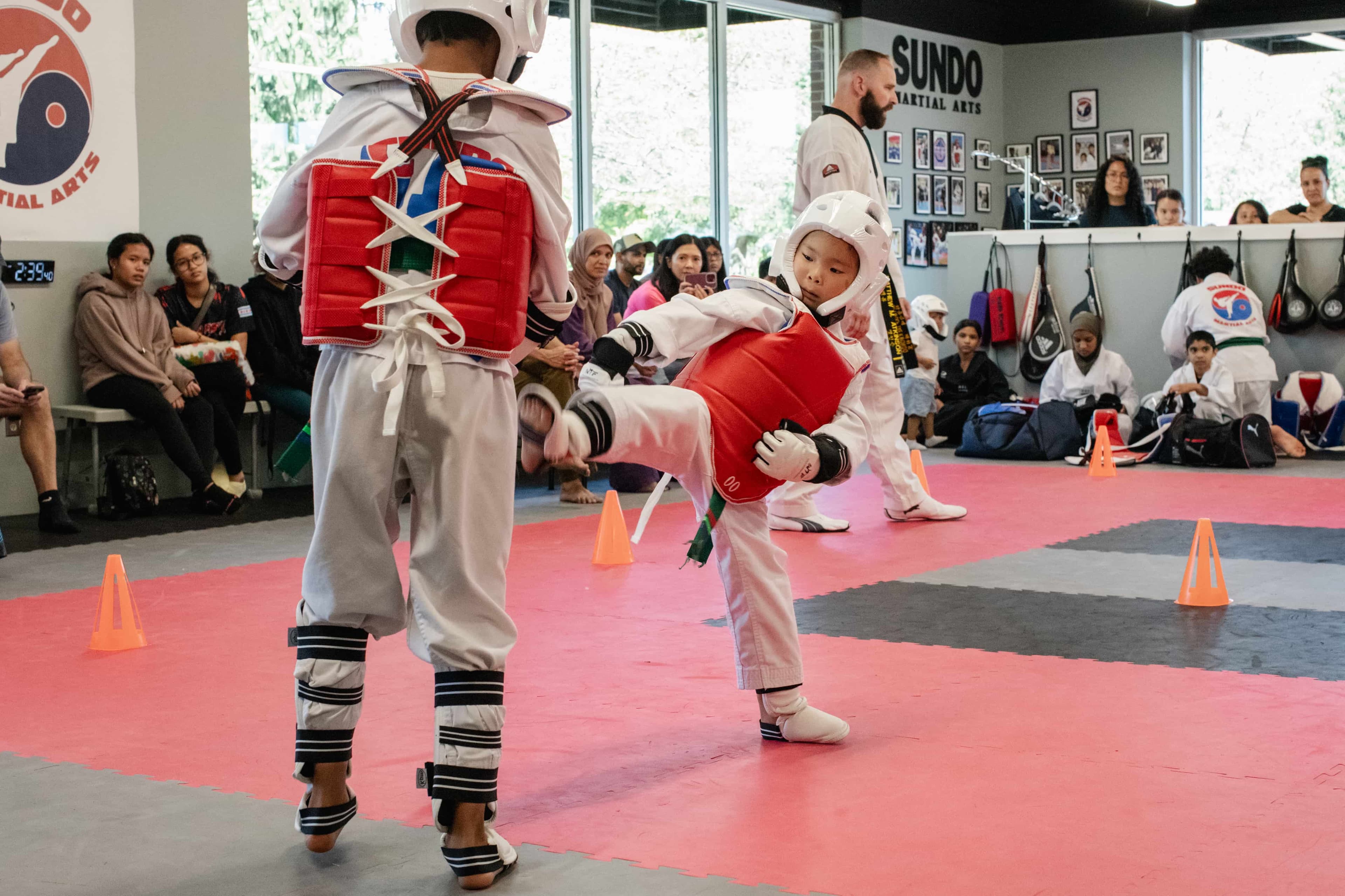 Two young Sundo students sparring