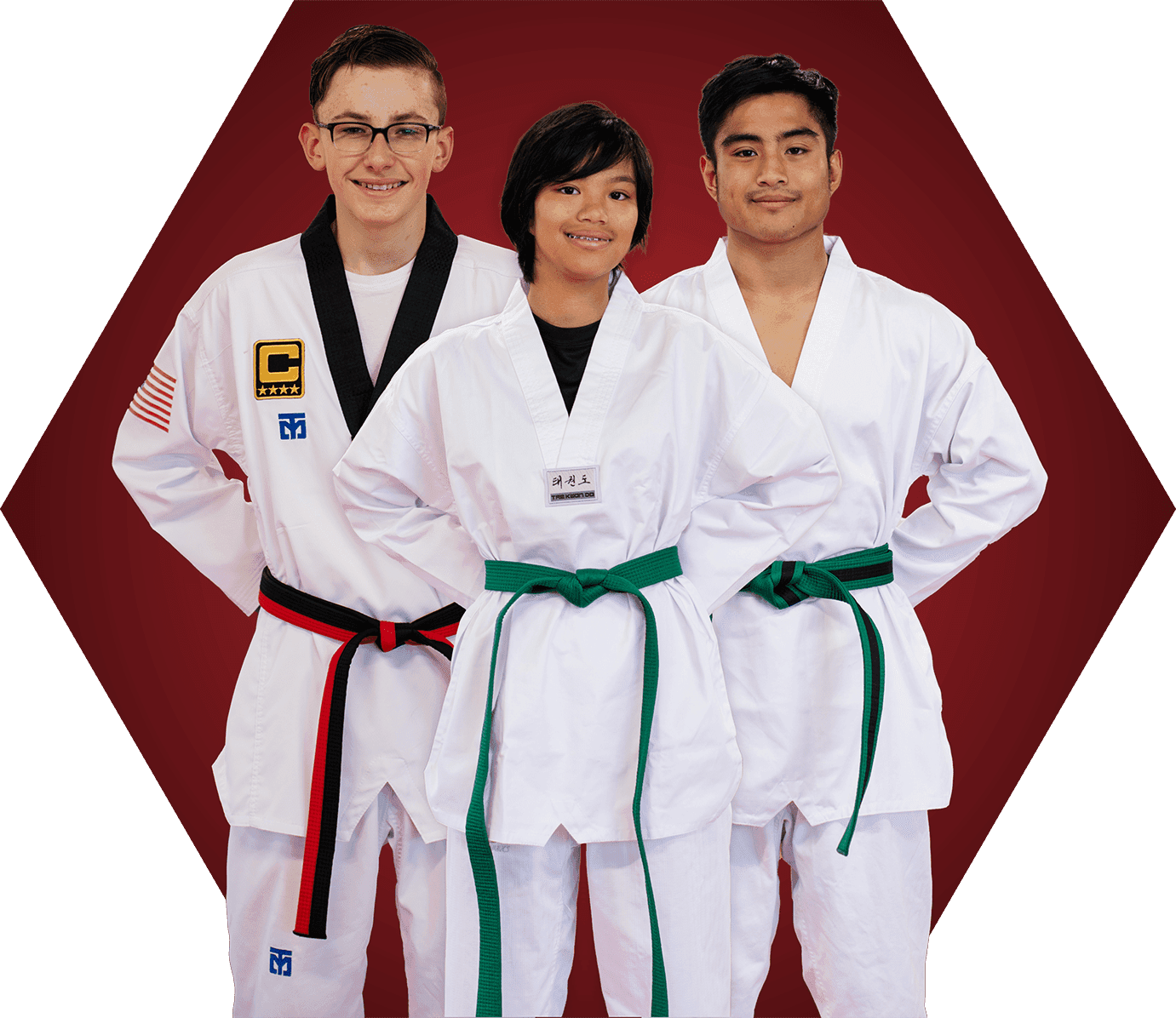 Three teen taekwondo students